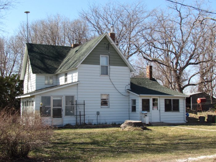 At Auction: 15.82 Acres with Cropland showing #100 CSR-2, along with 3 Bedroom Home, Barn, and Trees